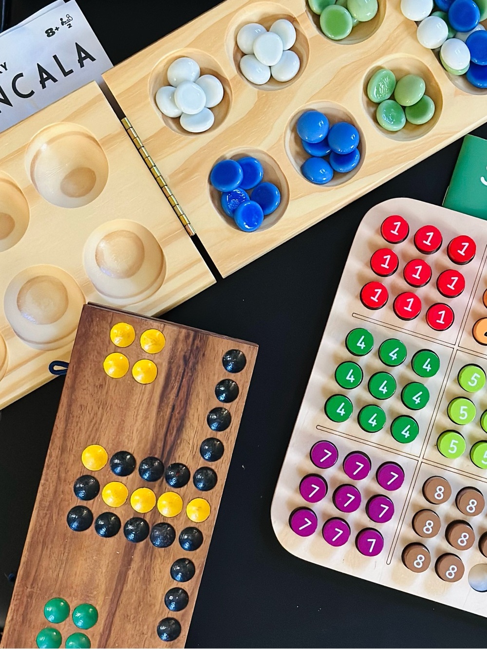 3 wooden crafted strategy games